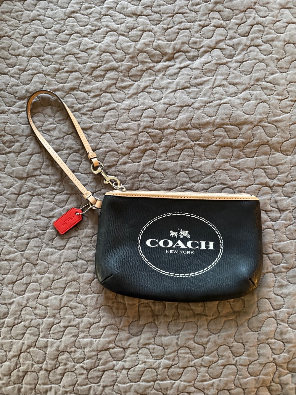 Coach Black Wristlet with Tan Strap and Red Accent